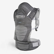 Grey knit baby carrier with hood, front pouch, and adjustable shoulder straps