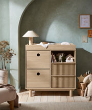 Light oak dresser changer with two drawers and open ribbed storage compartments