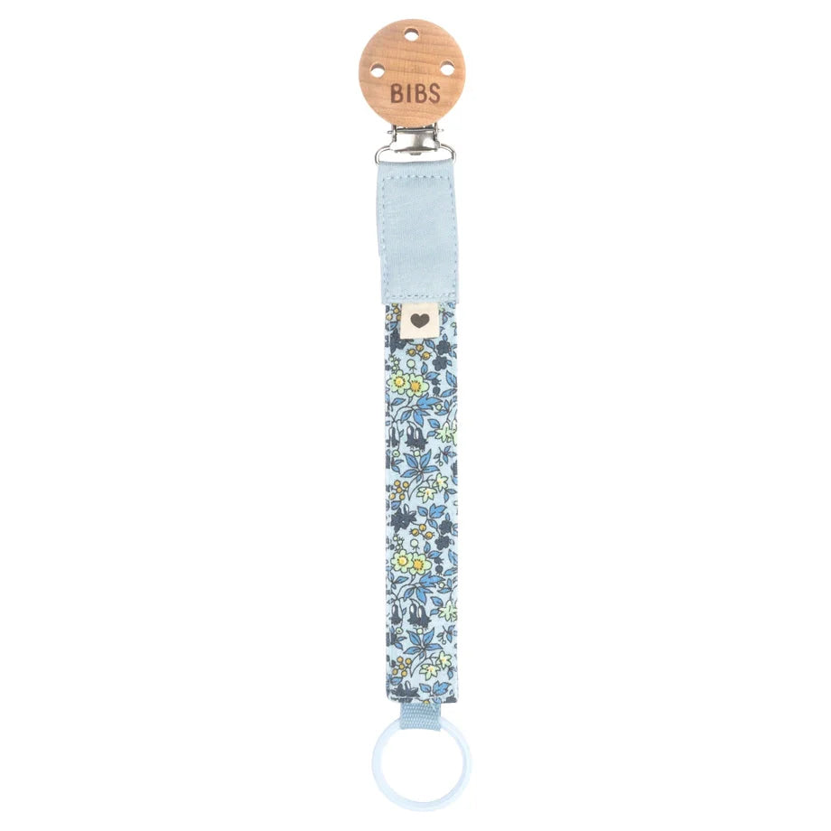 BIBS pacifier clip with blue denim and chamomile floral fabric strap and ring