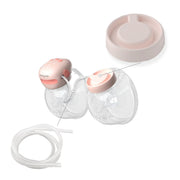 Breast pump spare parts kit with two breast shield cups and clear tubing