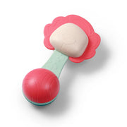 Red rattle teether with flower-shaped pink ring and mint handle, textured grips
