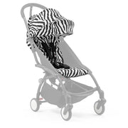 Zebra print stroller canopy and seat cover with black harness straps