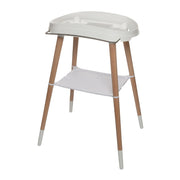 White bath stand with oval tub, light wood legs, and lower support tray