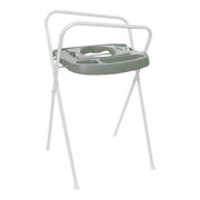 Green plastic bath support stand with round basin and side handle