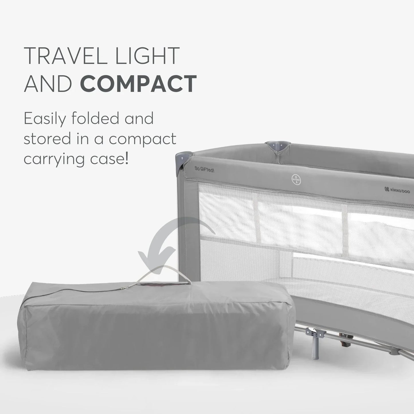 Compact travel crib with carrying case on a white background