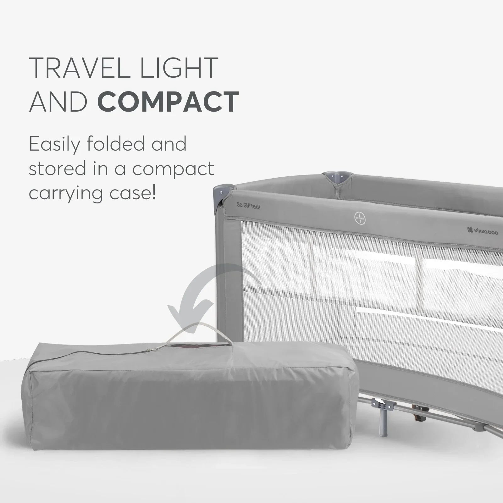 Compact travel crib with carrying case on a white background