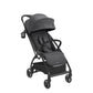 Dark grey pushchair stroller with canopy and armrests, side angled view