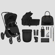 Black 2-in-1 stroller with carrycot, seat unit, bags and accessories shown flat