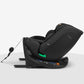 Black car seat in side profile with reclining position and padded five-point harness