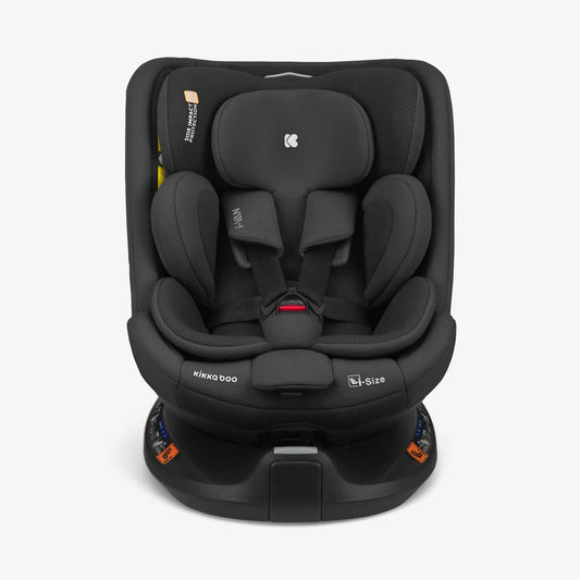 Black car seat with padded headrest, reclined seat, and five-point harness