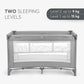 Grey 2-level baby cot front view with mesh panels and adjustable bars