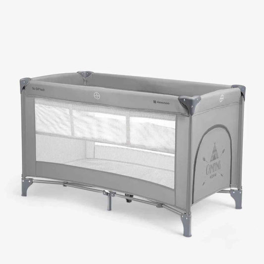 Grey 2-level baby cot with open mesh sides and padded top rail
