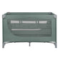Green baby cot front view with mesh upper section and fabric inner panel