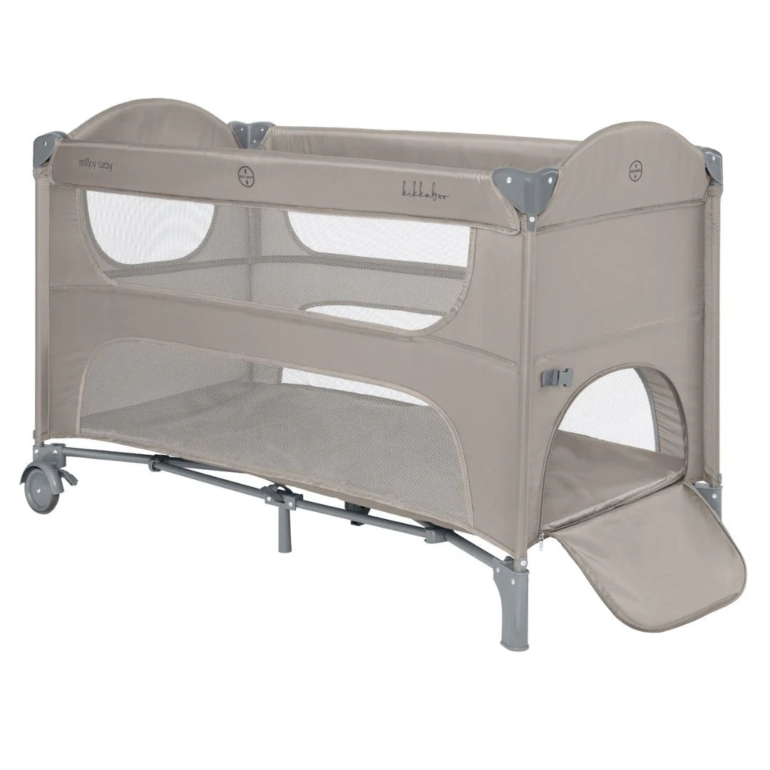 Beige baby cot with mesh side windows, padded posts, and rounded end panel
