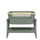 Army green bedside crib front view with white mesh insert and wooden edge trim