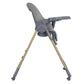 Dark grey high chair viewed from side with reclining seat and footrest