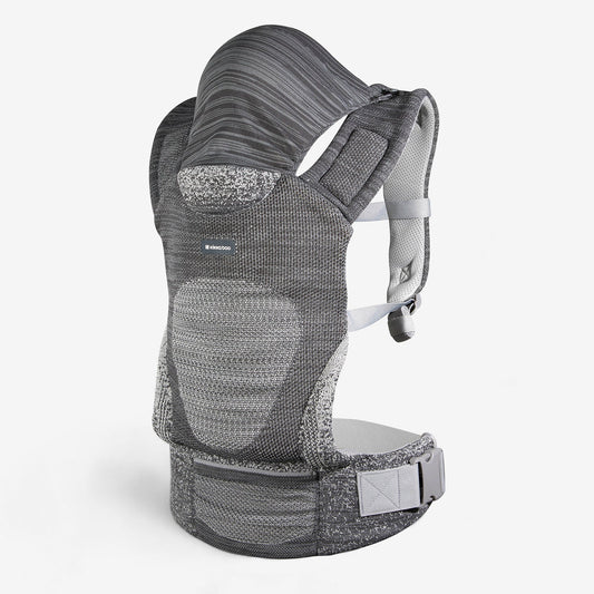 Grey knit baby carrier with hood, front pouch, and adjustable shoulder straps