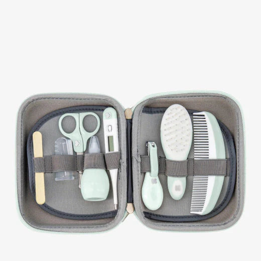 8-piece baby grooming kit open in gray zip pouch with comb, brush and nail care tools