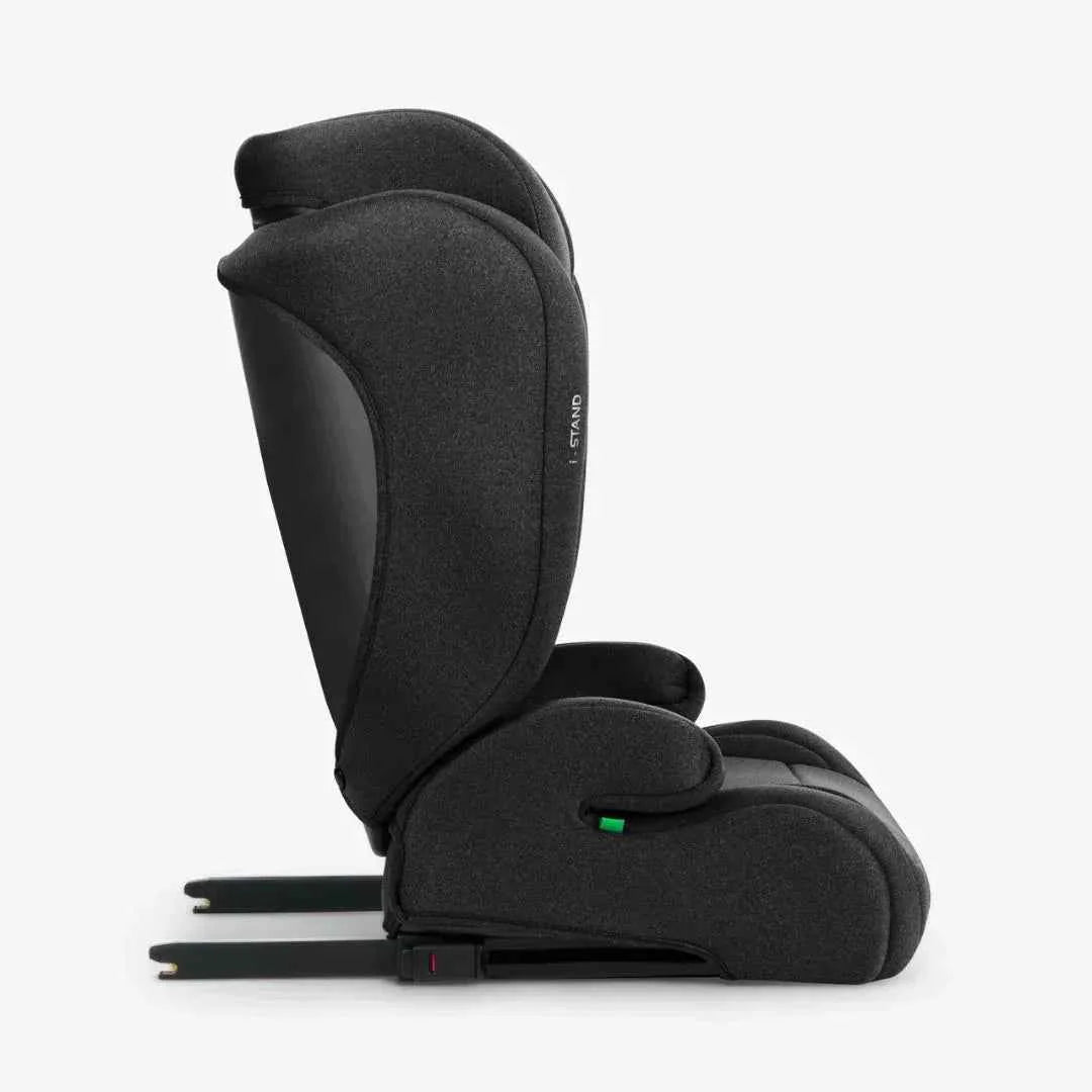 Black i-SIZE car seat shown from the side with padded headrest and recline base