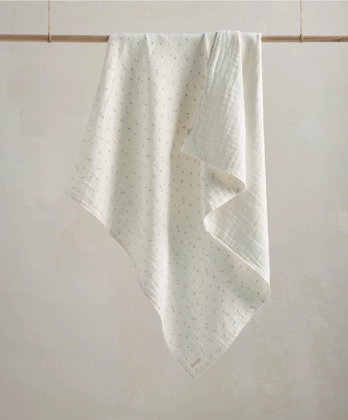 Muslin baby blanket, white with small dot pattern and stitched border