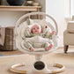 Cream baby swing with plush seat, safety harness, and hanging toy arch.