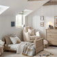 Oak cotbed with open slatted rail and low mattress position