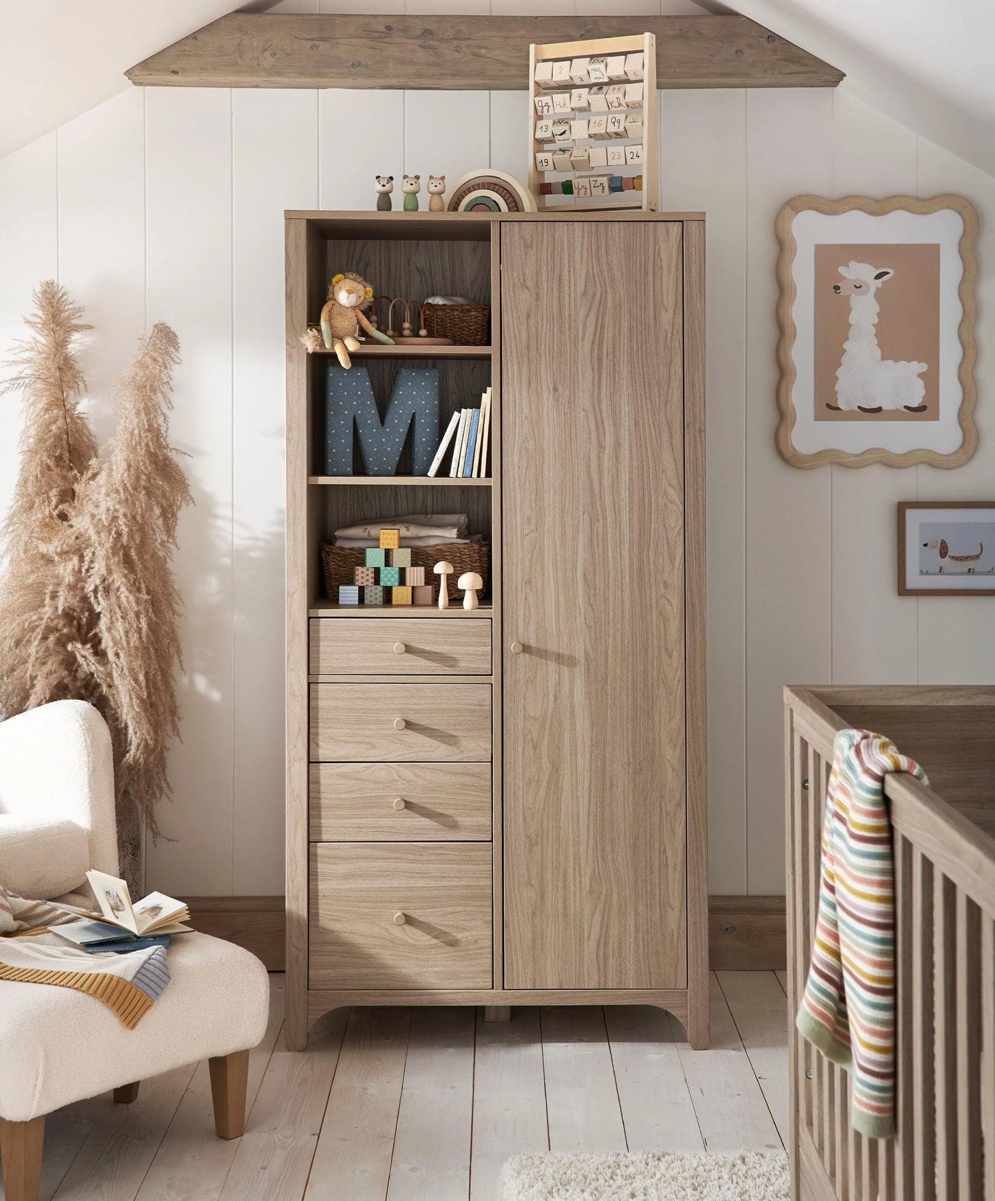 Oak-finish wardrobe with open shelves, hanging space, and three lower drawers