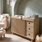 Oak wide dresser changer with fluted side panels and three front drawers
