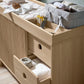 Oak wide dresser changer with open drawer and organizer bins on the changing top
