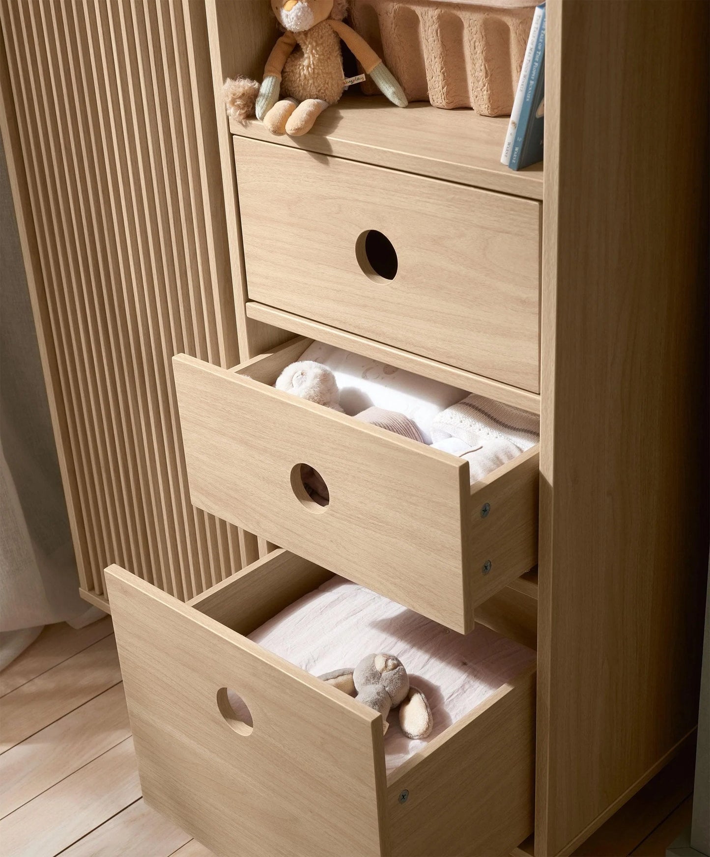 Oak wardrobe drawer unit with two open pull-out drawers and oval handles