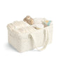 Beige leaf-pattern nappy caddy with padded sides, open top organizer and handles