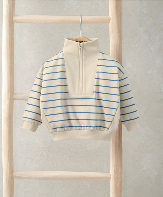 Off-white funnel neck jumper with blue stripe panels and half-zip front