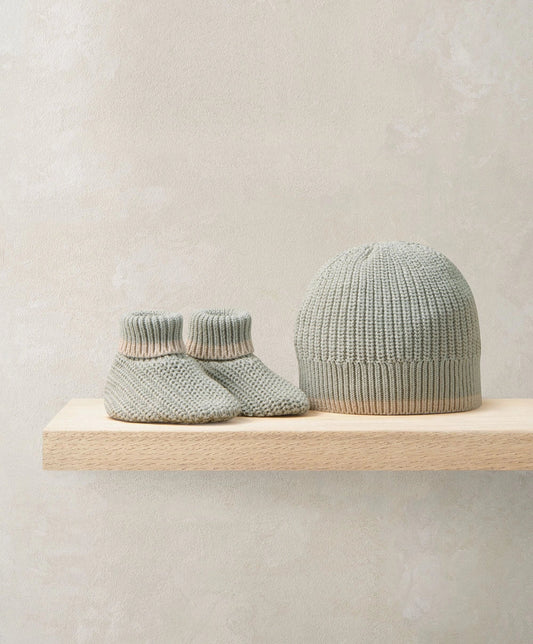 Knit baby booties and gray beanie set with ribbed cuffs and brim