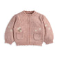Pink daisy-knit cardigan with button placket and ribbed hem; long sleeves