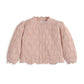 Pink knit cardigan with button front, raised cable-knit pattern, long puff sleeves