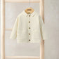 Cream collared knitted cardigan with button front and two front patch pockets