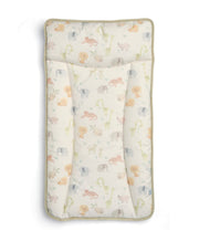 Safari animal print changing mattress pad with stitched edge, light cream background
