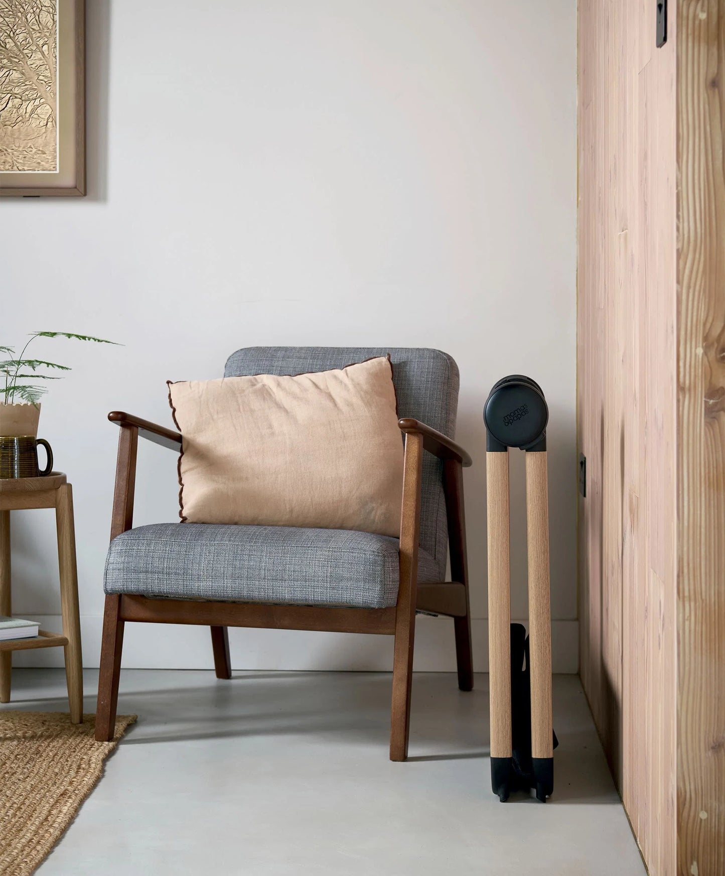 Carrycot stand frame with wooden legs and upright dark base
