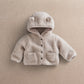 Cream hooded borg jacket with button front and two flap pockets.