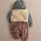 Color-block pramsuit hooded back view, gray hood and sleeves with beige and plum legs