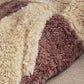 Color-block pramsuit fleece panel close-up, cream and dark plum plush pile