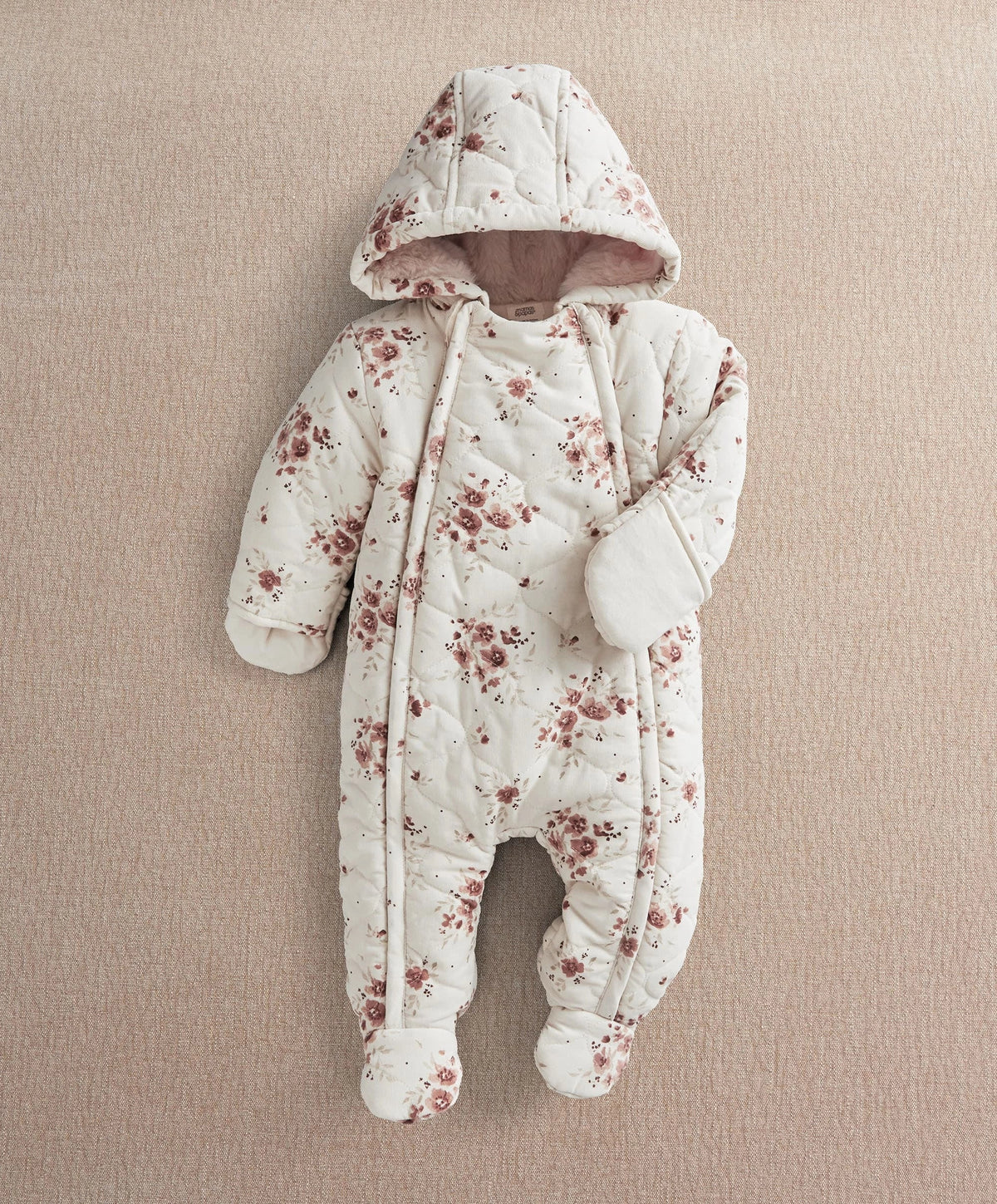 Ditsy print pramsuit with long sleeves, hood and pink floral pattern on off-white