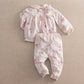 Watercolour floral pyjama set in pale pink, long-sleeve top and cuffed long trousers