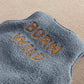 Blue fleece sleeveless gilet with 'BORN WILD' large orange back print