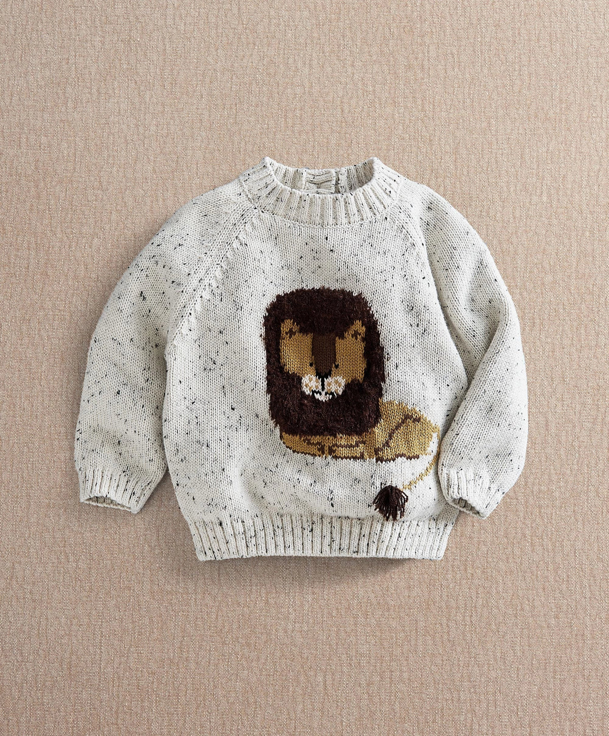 Children's lion knit jumper, cream speckled knit with brown and yellow lion front