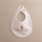 Pink baby bib with snap at neck opening and embroidered bear 'born in 2027'