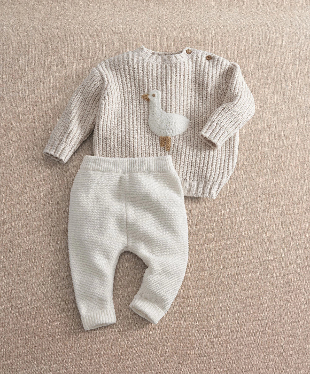 2-piece duck legging set with knitted cream sweater and matching pants
