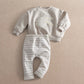 Light gray sweatshirt and striped leggings set with bunny graphic, ribbed cuffs and waistband