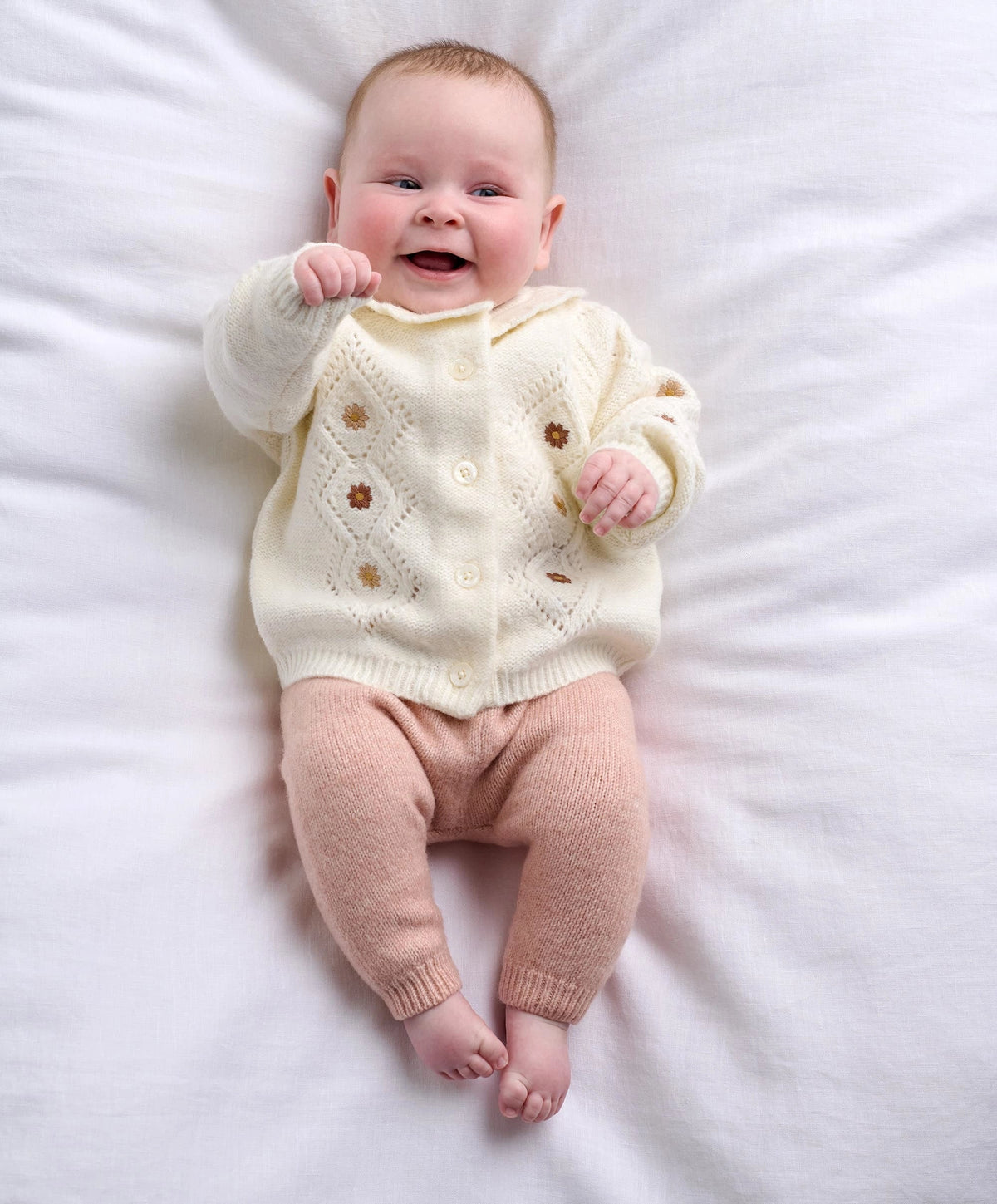 Cream embroidered knit cardigan and mauve knit leggings set, button front and ribbed cuffs.