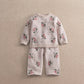 Knitted top and wide trousers set in light pink with berry print